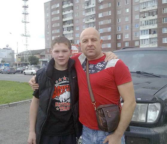 С тренером Николаем Суржиковым